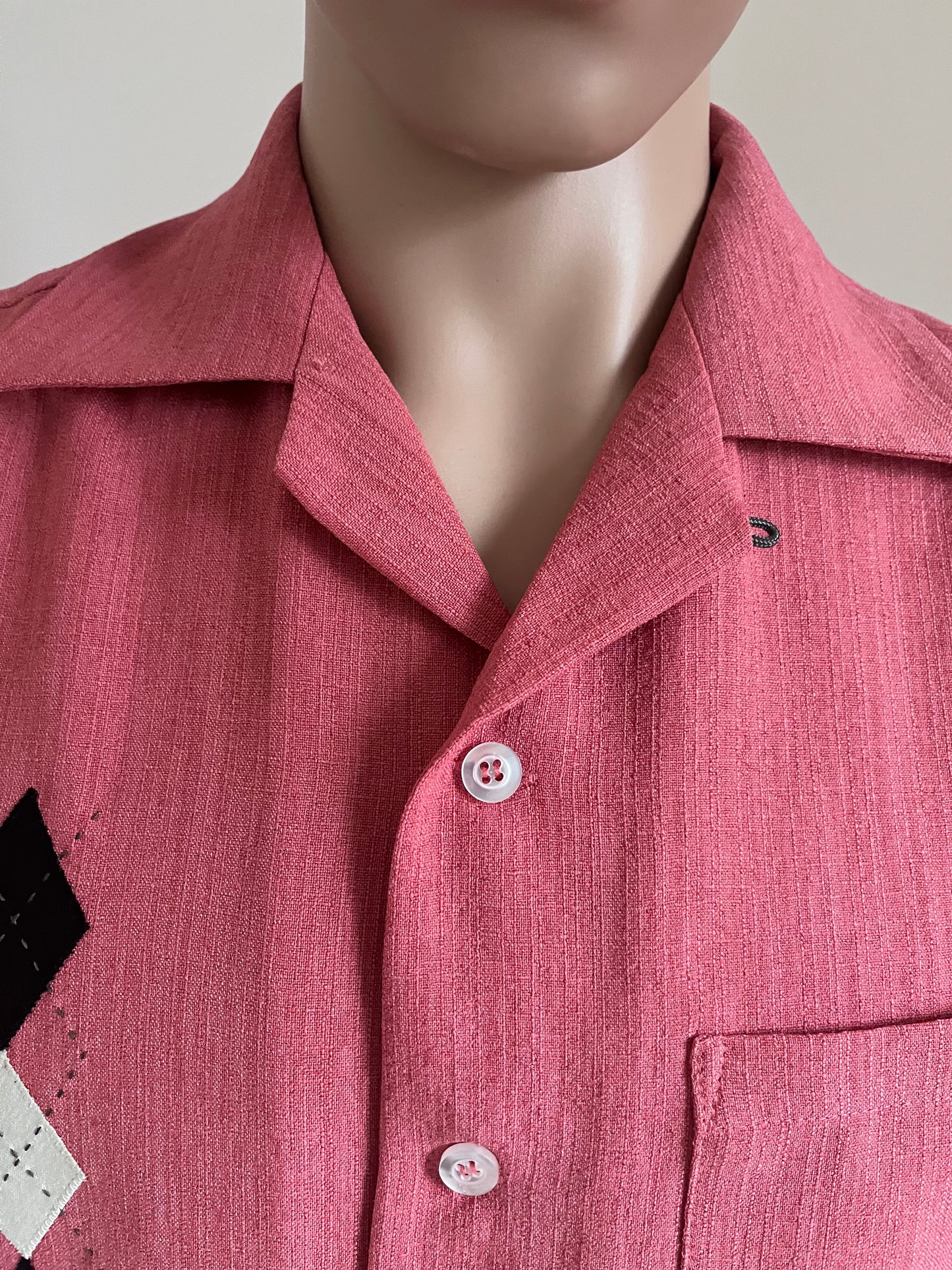 Pink shirt with embroidery detail