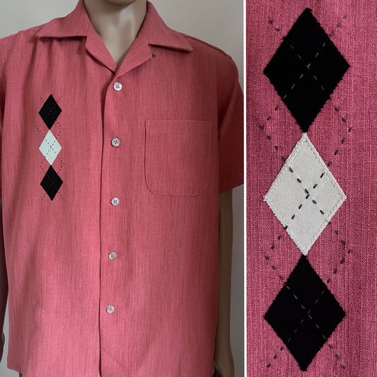 Pink shirt with embroidery detail